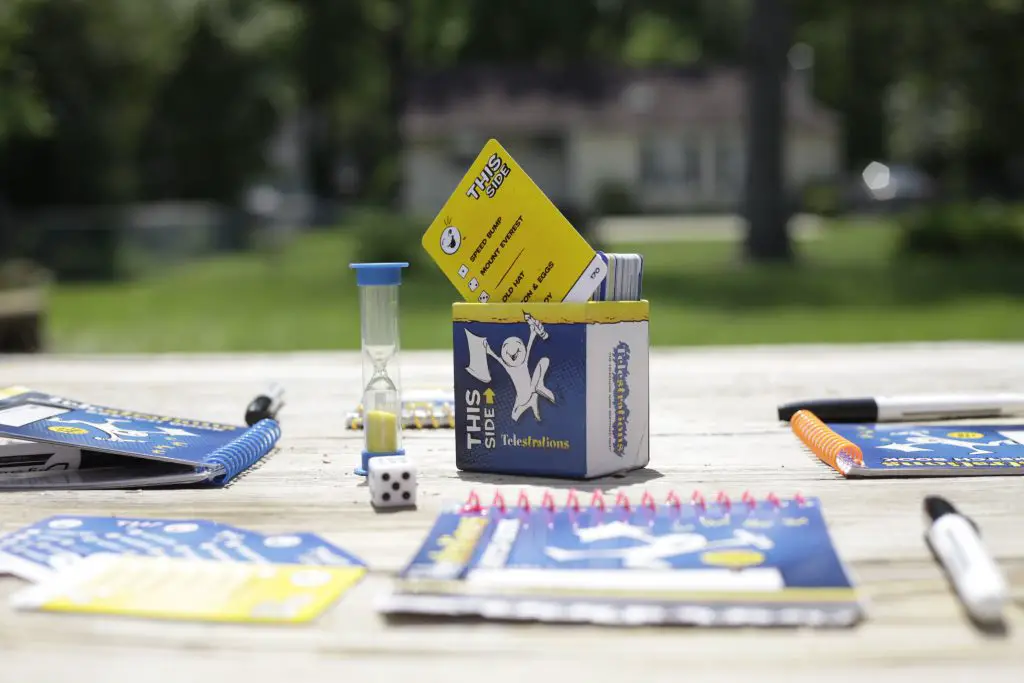 Telestrations outside, the best board game to play outside