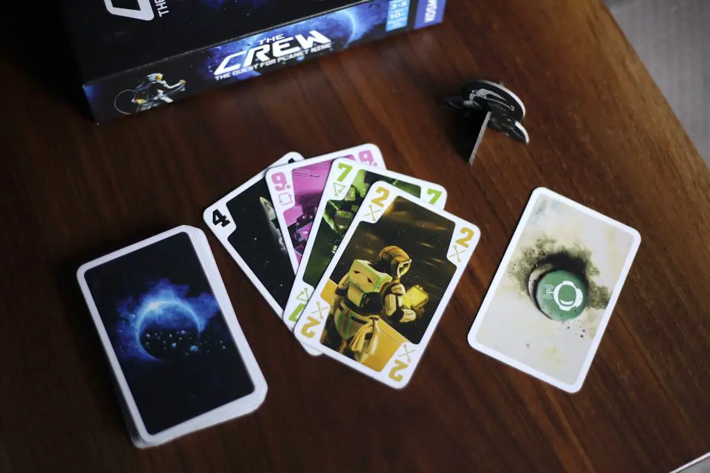 The Crew trick-taking game cards and pieces